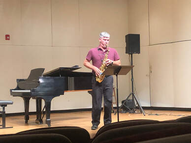Bart Walters performs Connor's solo on alto saxophone.