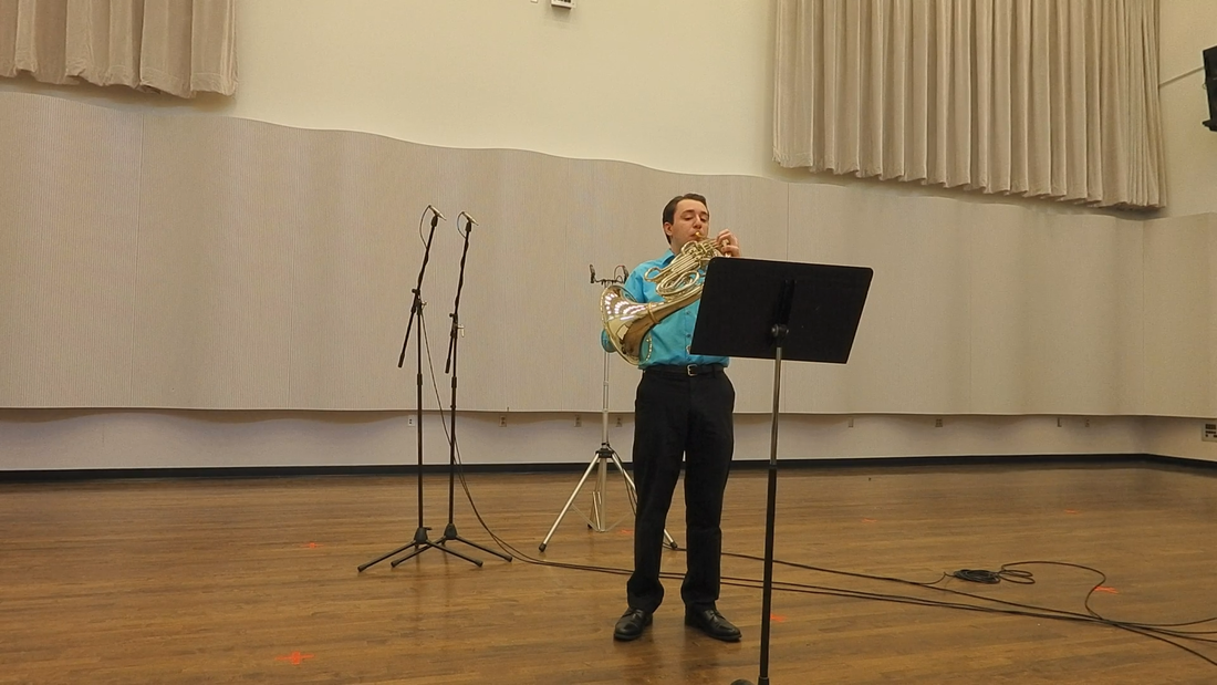 Michael Goss performs Connor's work on French horn.