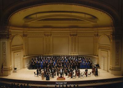 Connor singing in a choir at Carnegie Hall in New York.