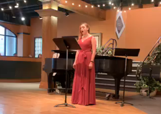 Edith Grace Dull sings Connor's song, accompanied by Chad Spears.