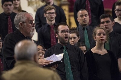 Connor singing a solo with a small jazz choir.