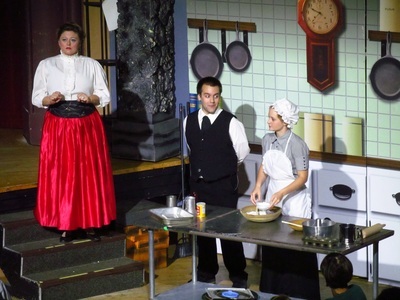 Connor acting mischievous in a musical theater scene.