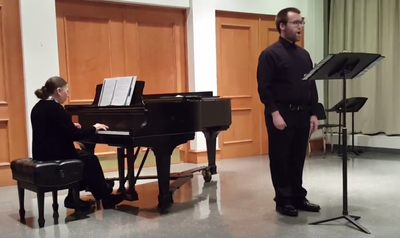 Connor Gibbs singing with Barbara Wesby playing piano.