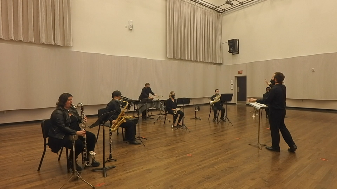 Connor conducts the chamber ensemble performing Connor's work.