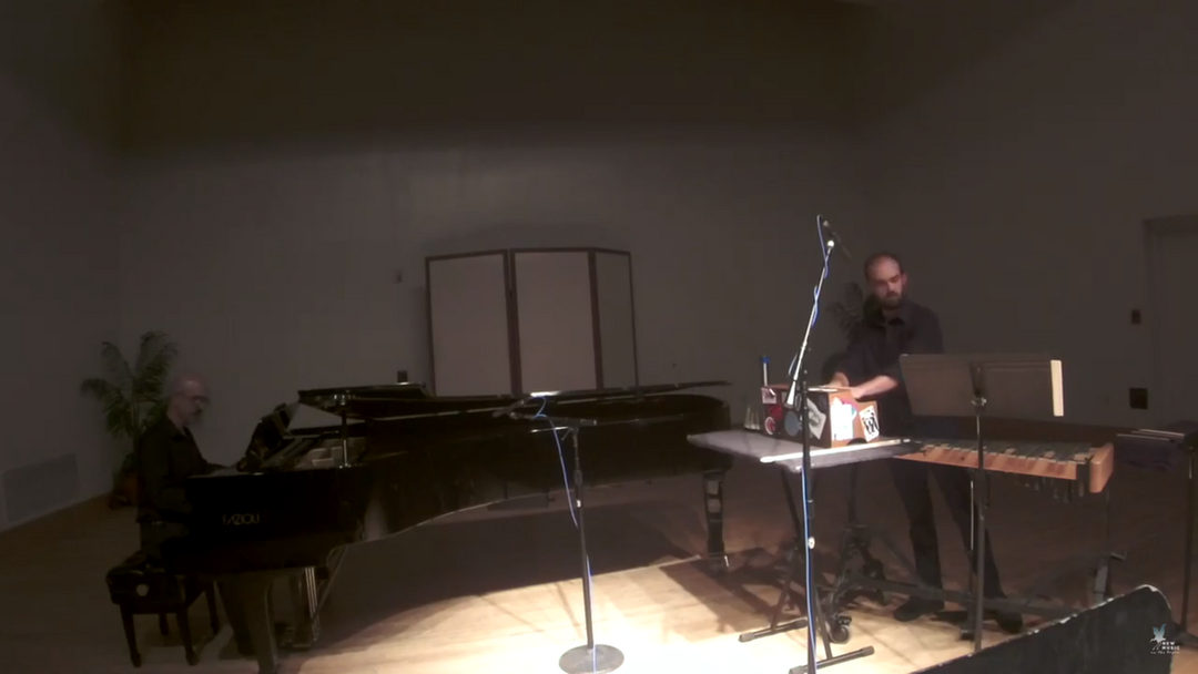 Mel and Mitchell Mobley perform Connor's duet for piano and percussion.