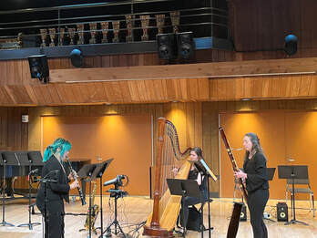 Michelle Cusick, Maya Grossman, and Danielle Kuntz perform Connor's trio work.